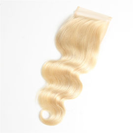 China Blondes Körper-Wellen-Spitze-Schließungs-Baby-Haar-brasilianisches wirkliches Menschenhaar der Farbe#613 fournisseur